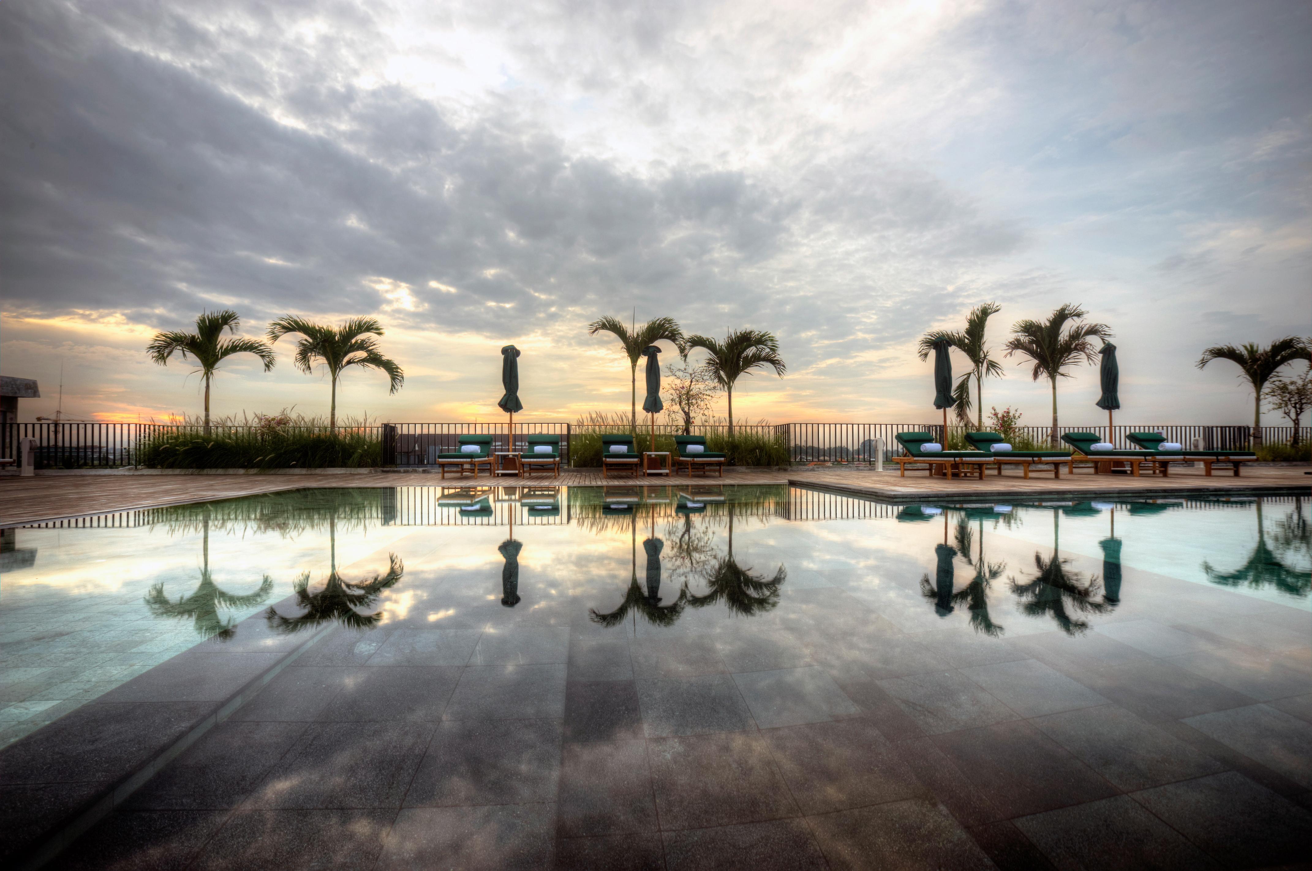 Отель Cross Paasha Bali Seminyak Экстерьер фото